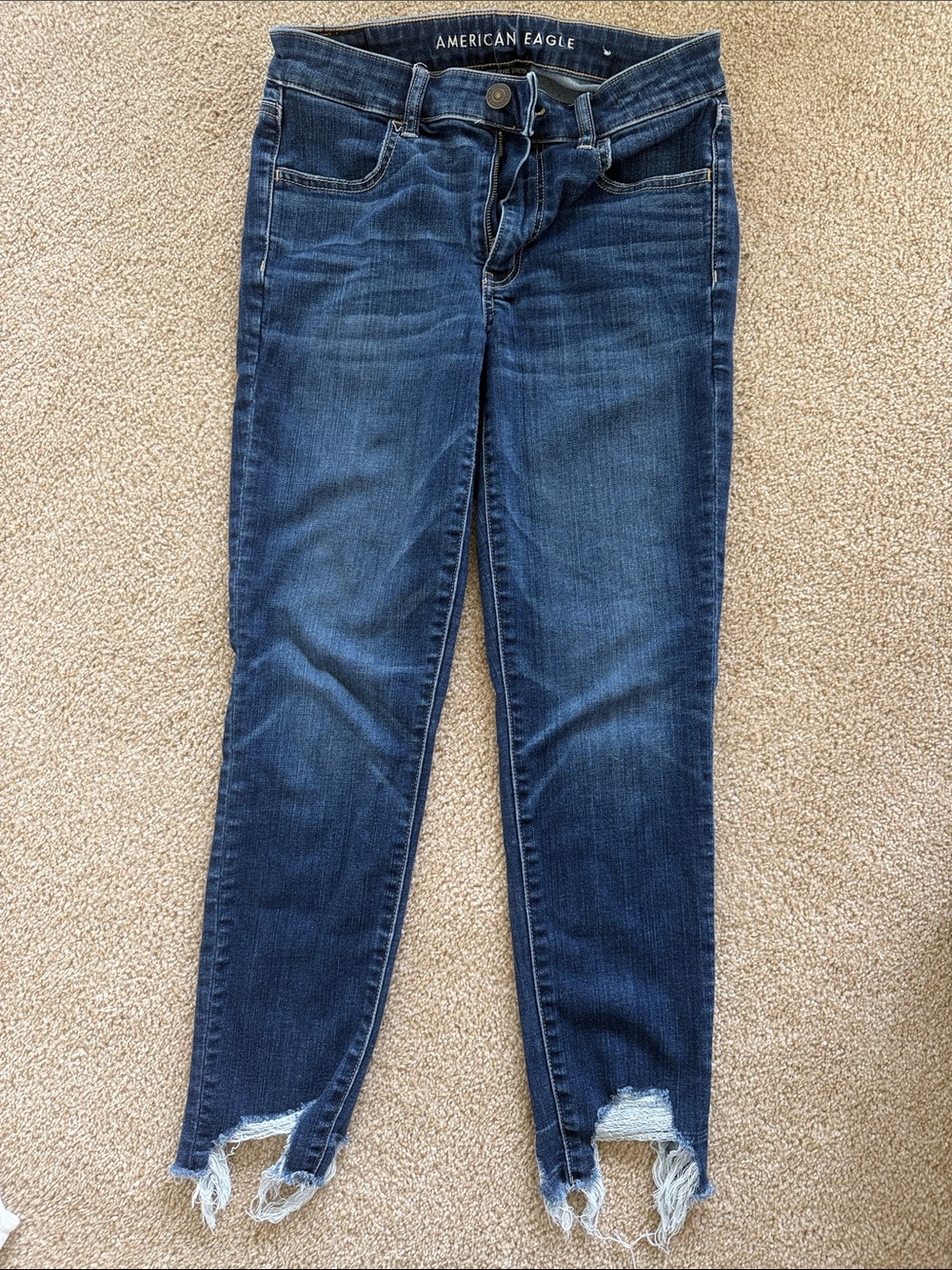 American Eagle Outfitters Blue Skinny Jeans with Distressed Hem